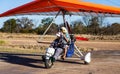 Tourists before the flight over Victoria Falls on trikes. Royalty Free Stock Photo